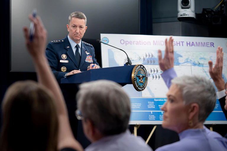 Chairman of the Joint Chiefs Gen. Dan Caine, looks towards a reporter with a raised hand during a press conference about Operation Midnight Hammer at the Pentagon