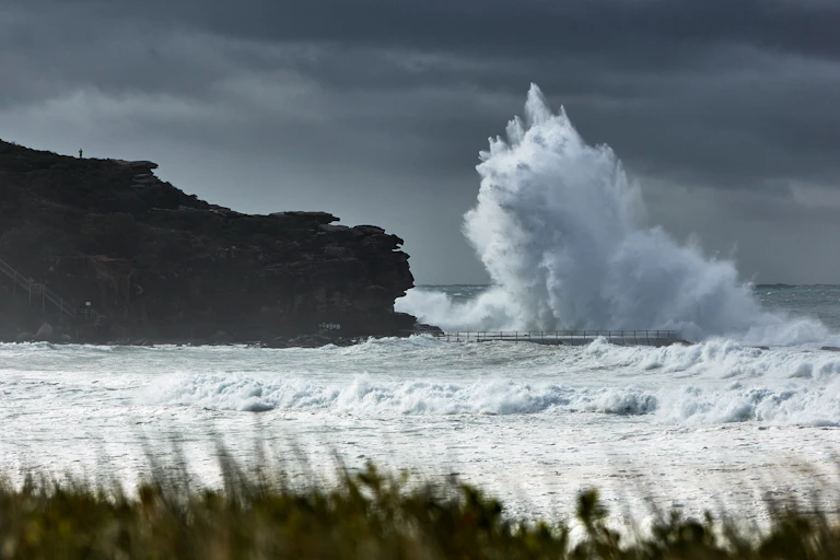 big waves breaking Sydney beach.