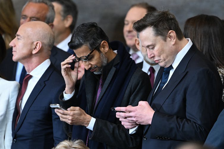Amazon founder Jeff Bezos, Google CEO Sundar Pichai and Tesla and SpaceX CEO Elon Musk attend the inauguration ceremony before Donald Trump is sworn in as the 47th US Presiden
