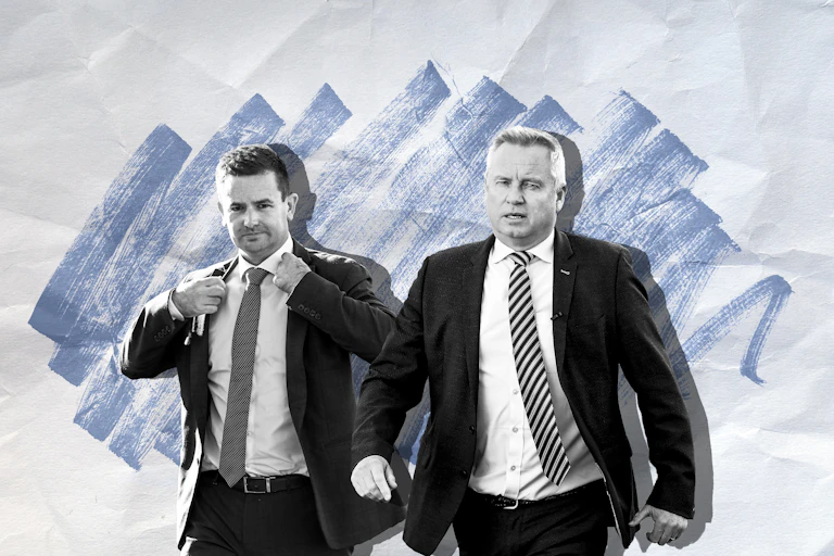 The black and white image of two men in suits against a blue pencil background on crumpled paper.