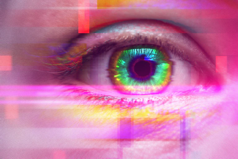 Female eye with colorful iris.