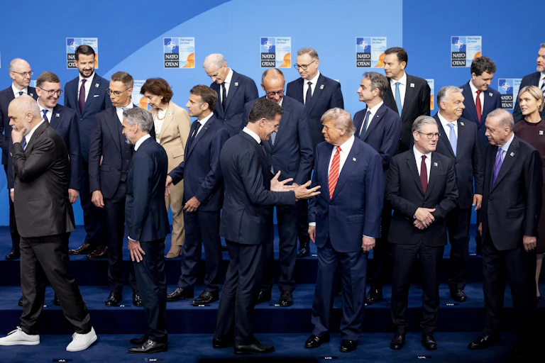 Donald Trump and Mark Rutte surrounded by other EU leaders at the Nato summit