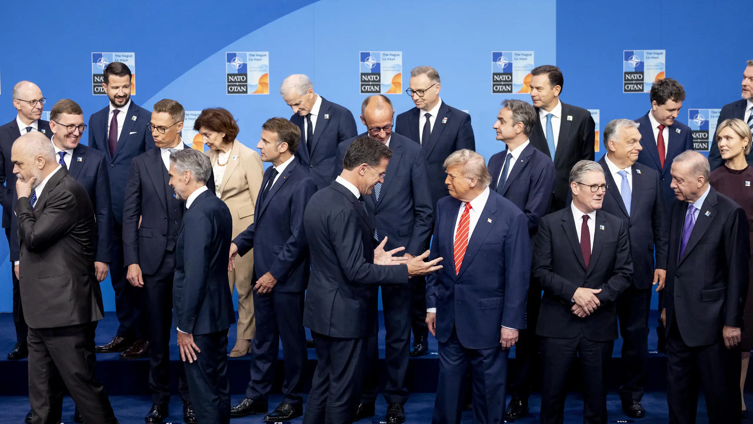 Donald Trump and Mark Rutte surrounded by other EU leaders at the Nato summit