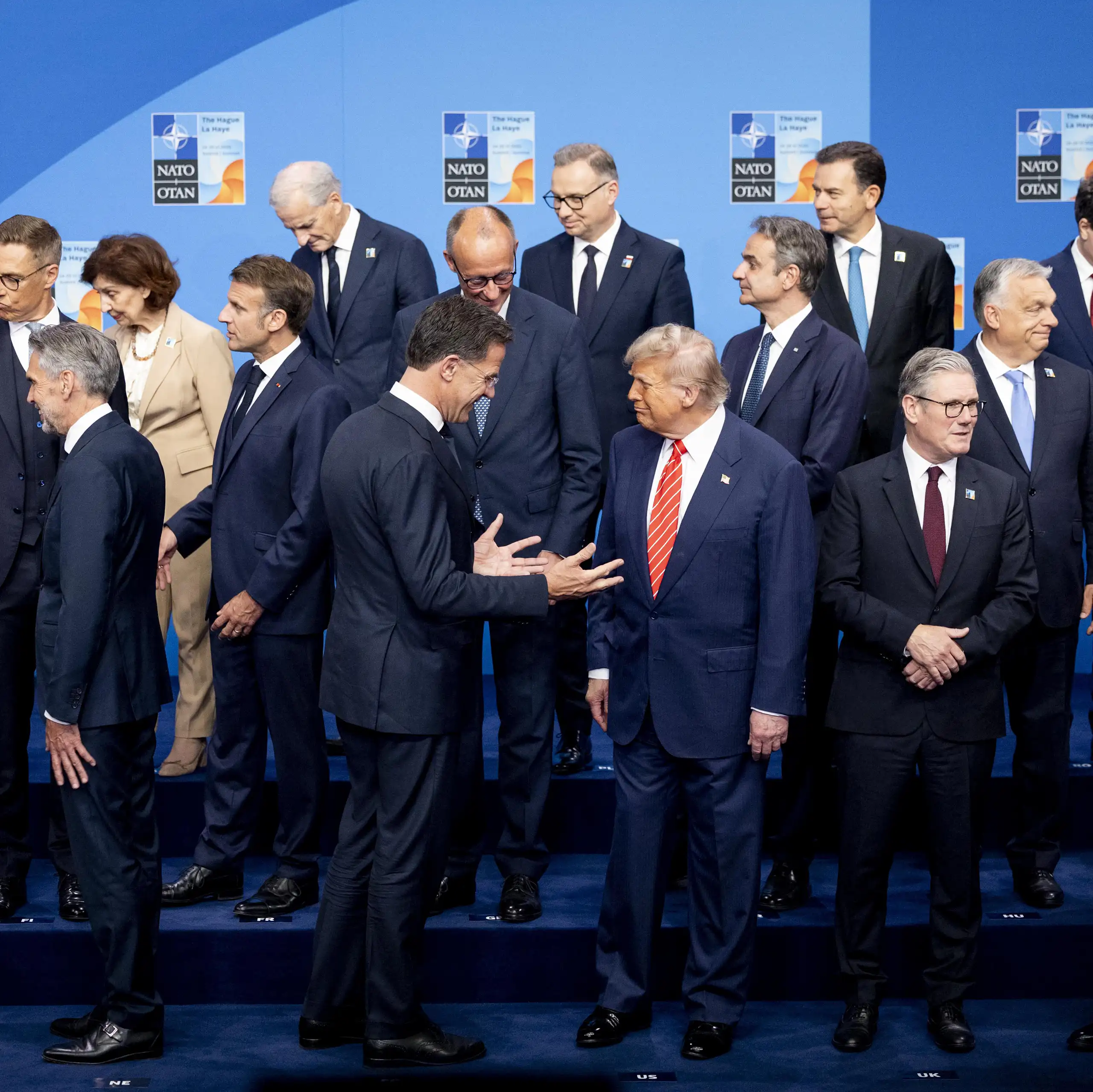 Donald Trump and Mark Rutte surrounded by other EU leaders at the Nato summit
