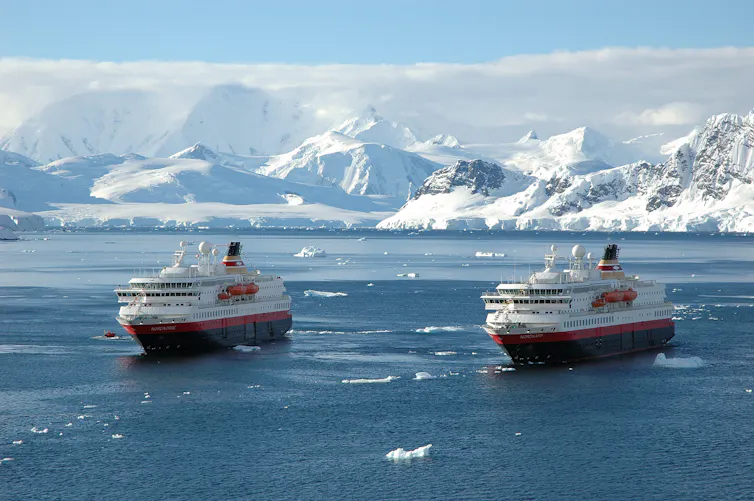 two cruise ships in icy seas