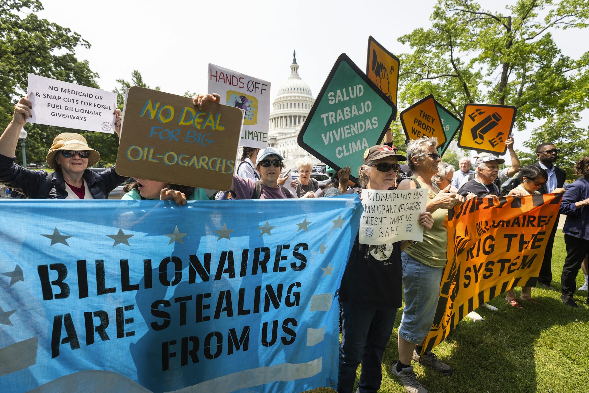 Protestors carrying banners outside Capitol Hill.