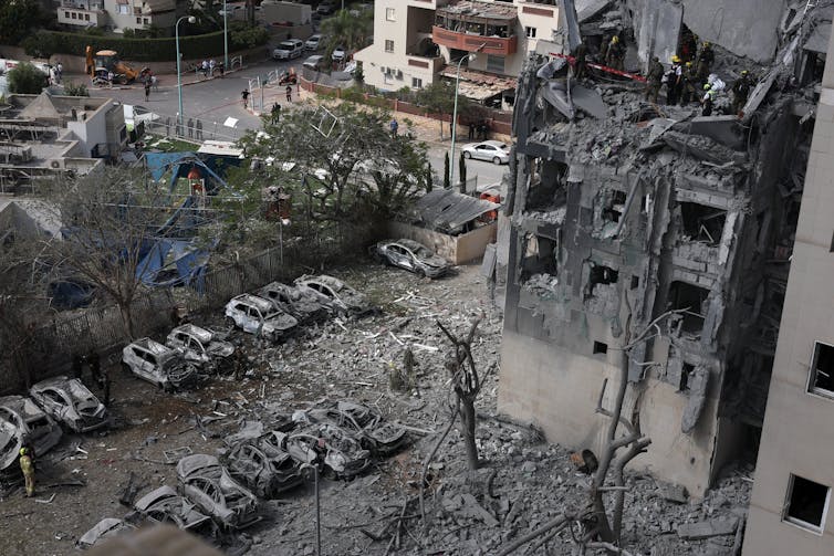 Damage at the site of a missile strike on a residential area in Be'er Sheva, southern Israel, 24 June 2025.