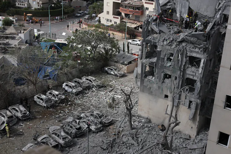 Damage at the site of a missile strike on a residential area in Be'er Sheva, southern Israel, 24 June 2025.