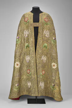 A gold and floral ceremonial cape from the Edwardian period.