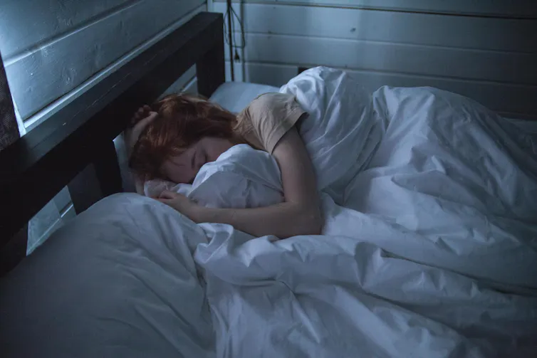 A woman sleeping.