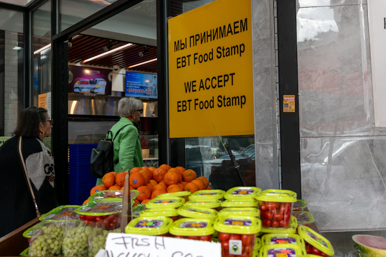 People shop for groceries.