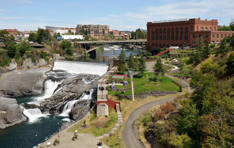 Spokane Falls includes a 25-foot dam and falls that tumble below it