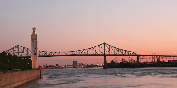 A steel bridge seen at sunset.