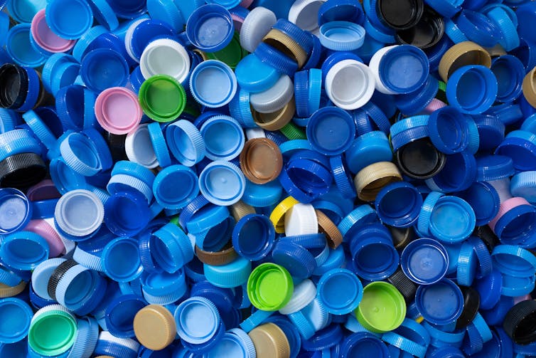 A pile of plastic lids.
