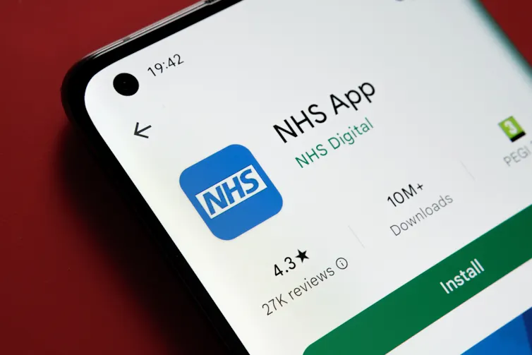 A mobile phone showing the NHS app.