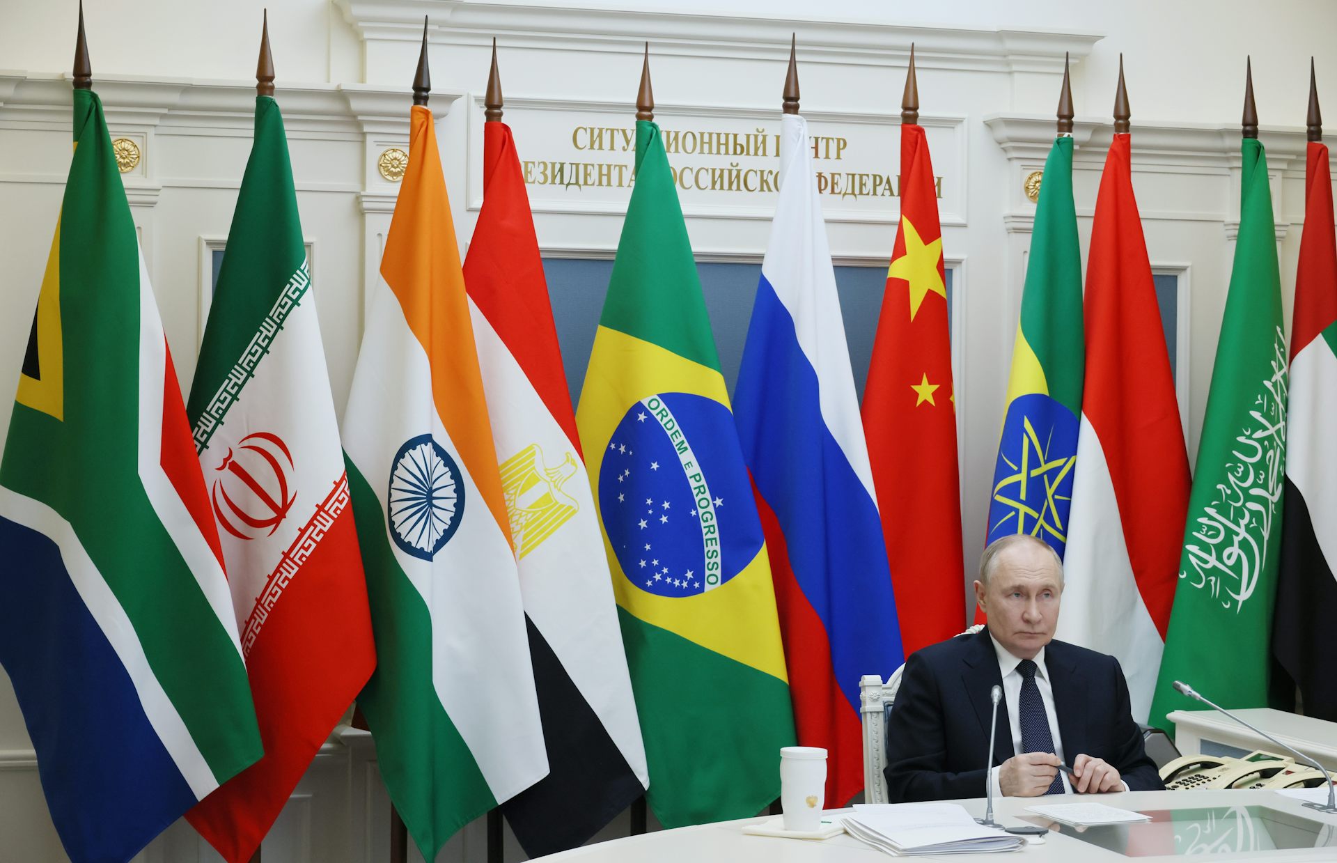 Putin participating in a Brics meeting via videoconference from the Kremlin.