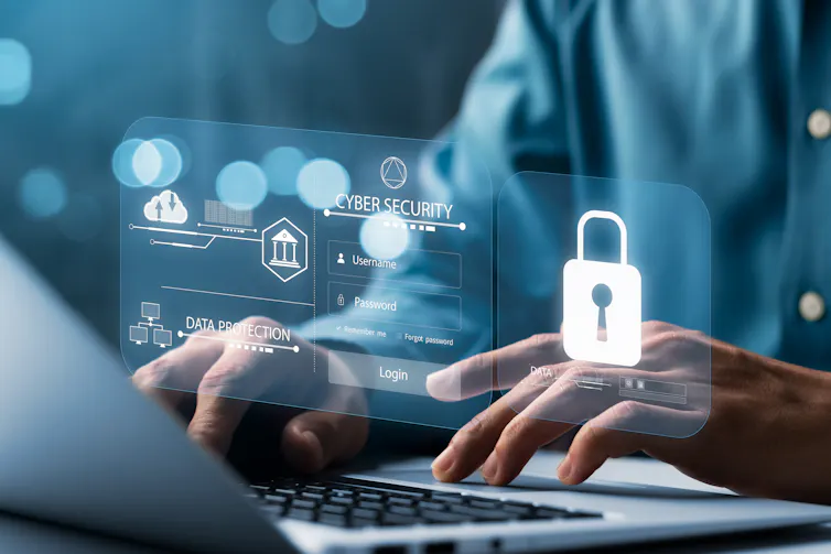 Laptop in use with with graphic of padlock and security images.