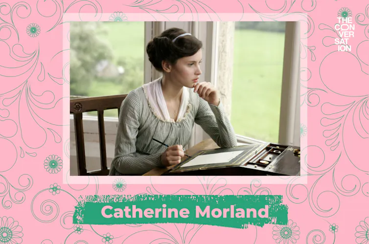 Felicity Jones sat at a writing desk