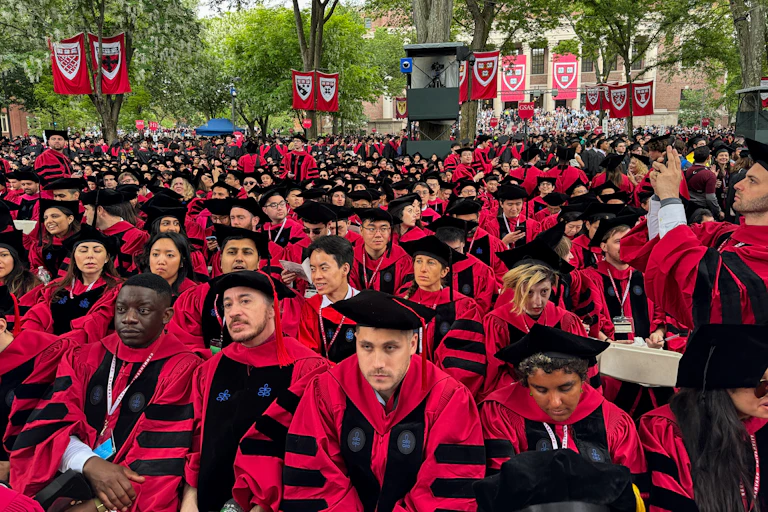 Graduates gather at the Harvard University commencement ceremony.