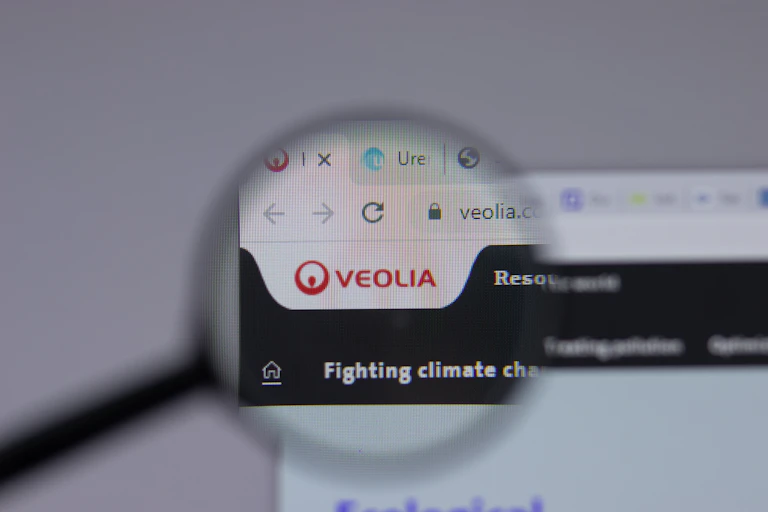 The red logo of the Veolia group appears above the words "Fighting climate" and what appears to be half of the word "change".