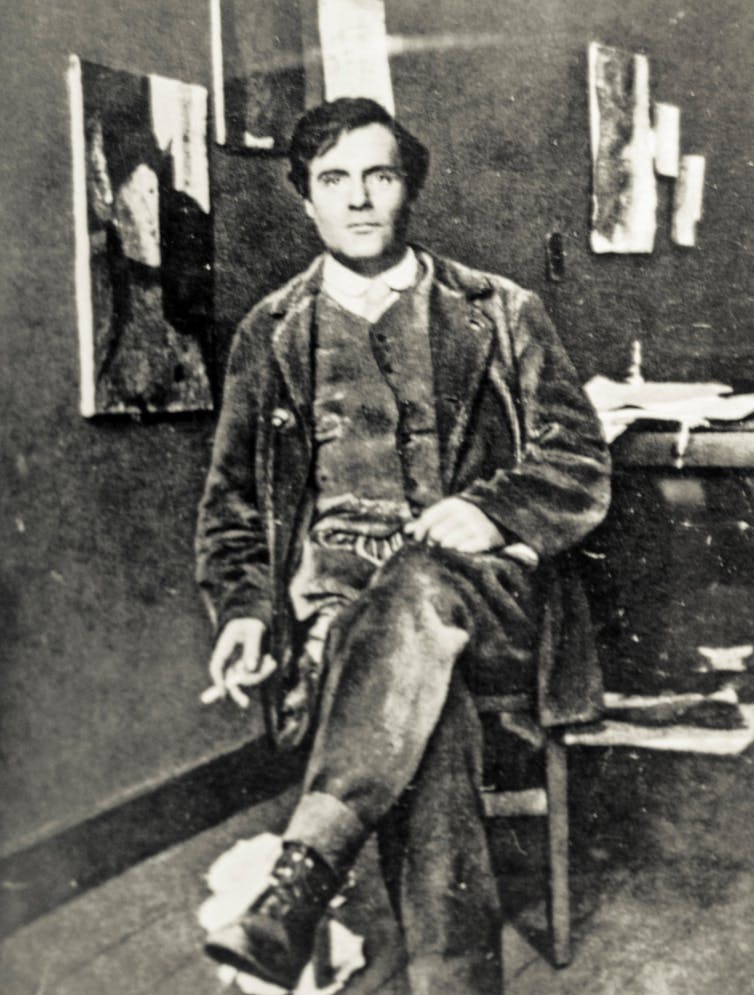 A black and white image of an artist in his studio in Paris in the early 20th century.
