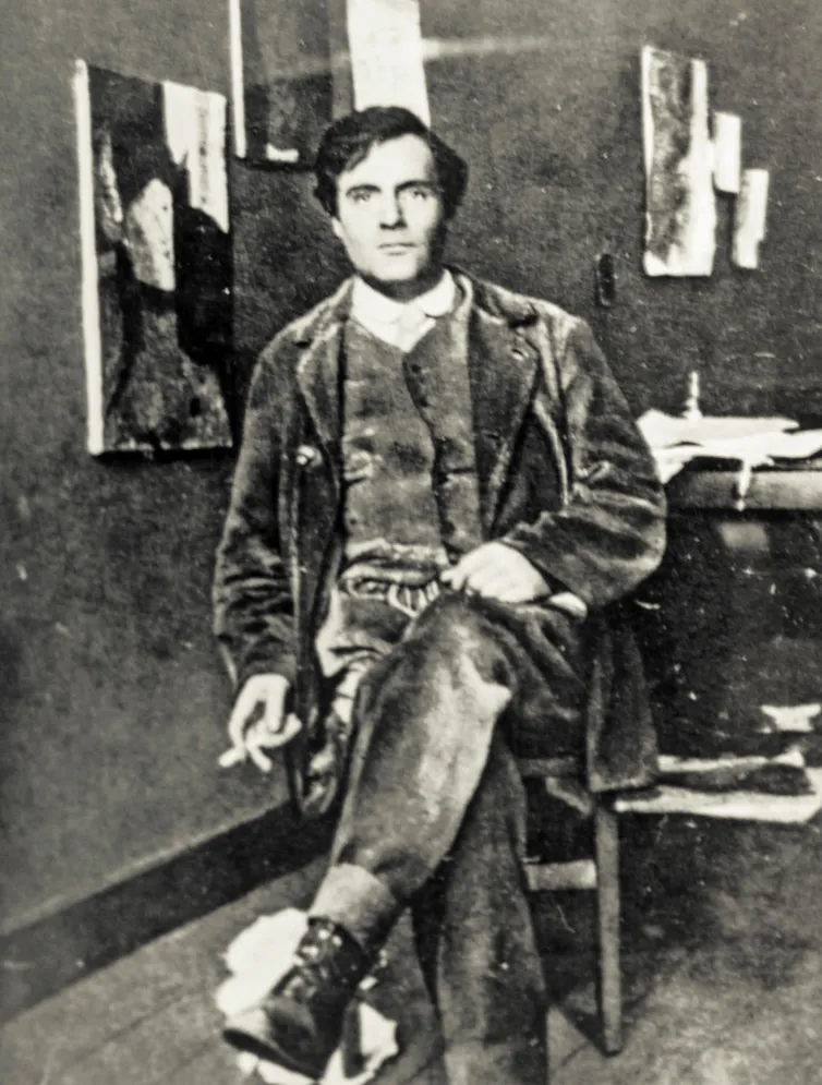 A black and white image of an artist in his studio in Paris in the early 20th century.