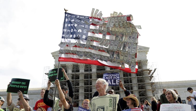 People attend a protest.
