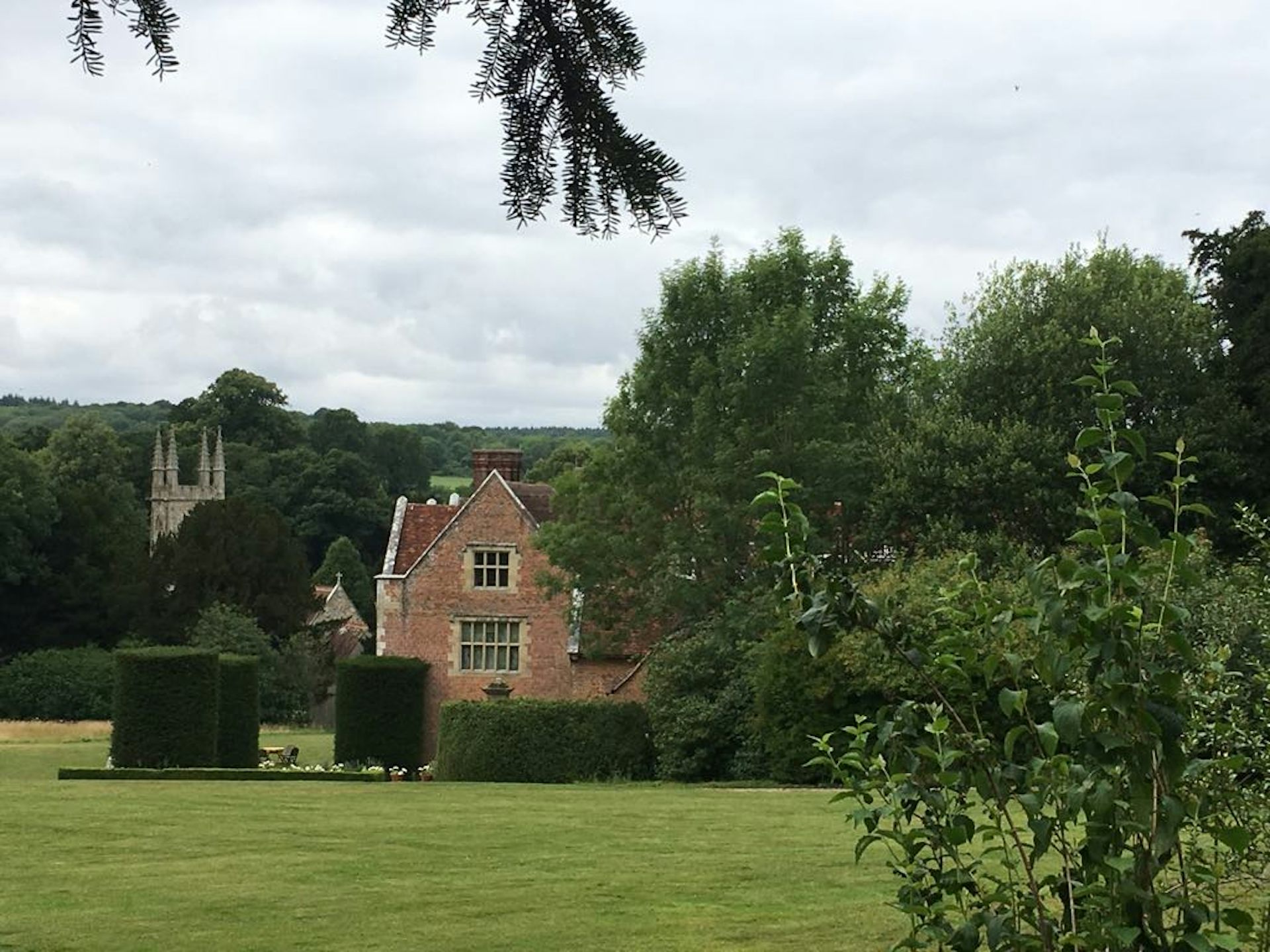 A house behind trees.