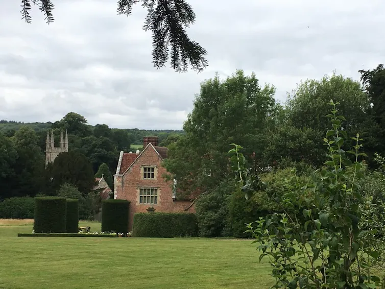 A house behind trees.