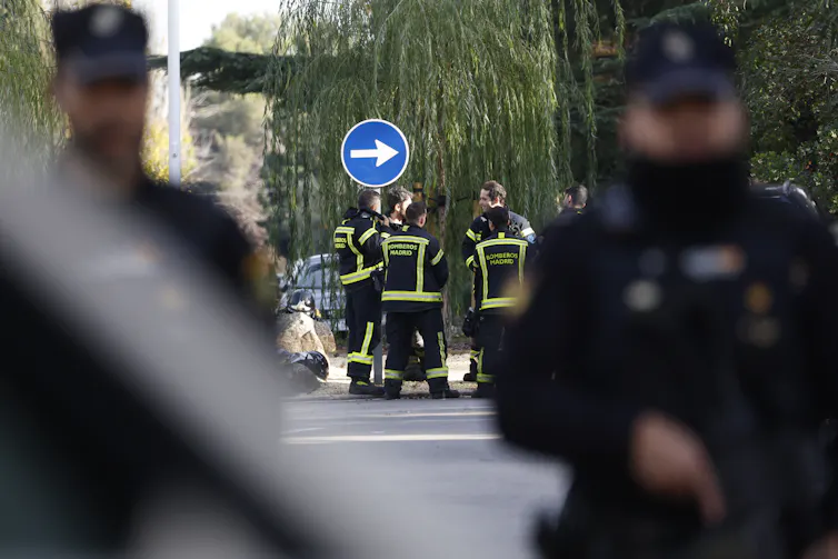 Police and firemen outside the Ukrainian embassy in Madrid.