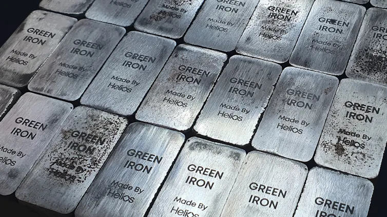 metal blocks bearing the words 'green iron'