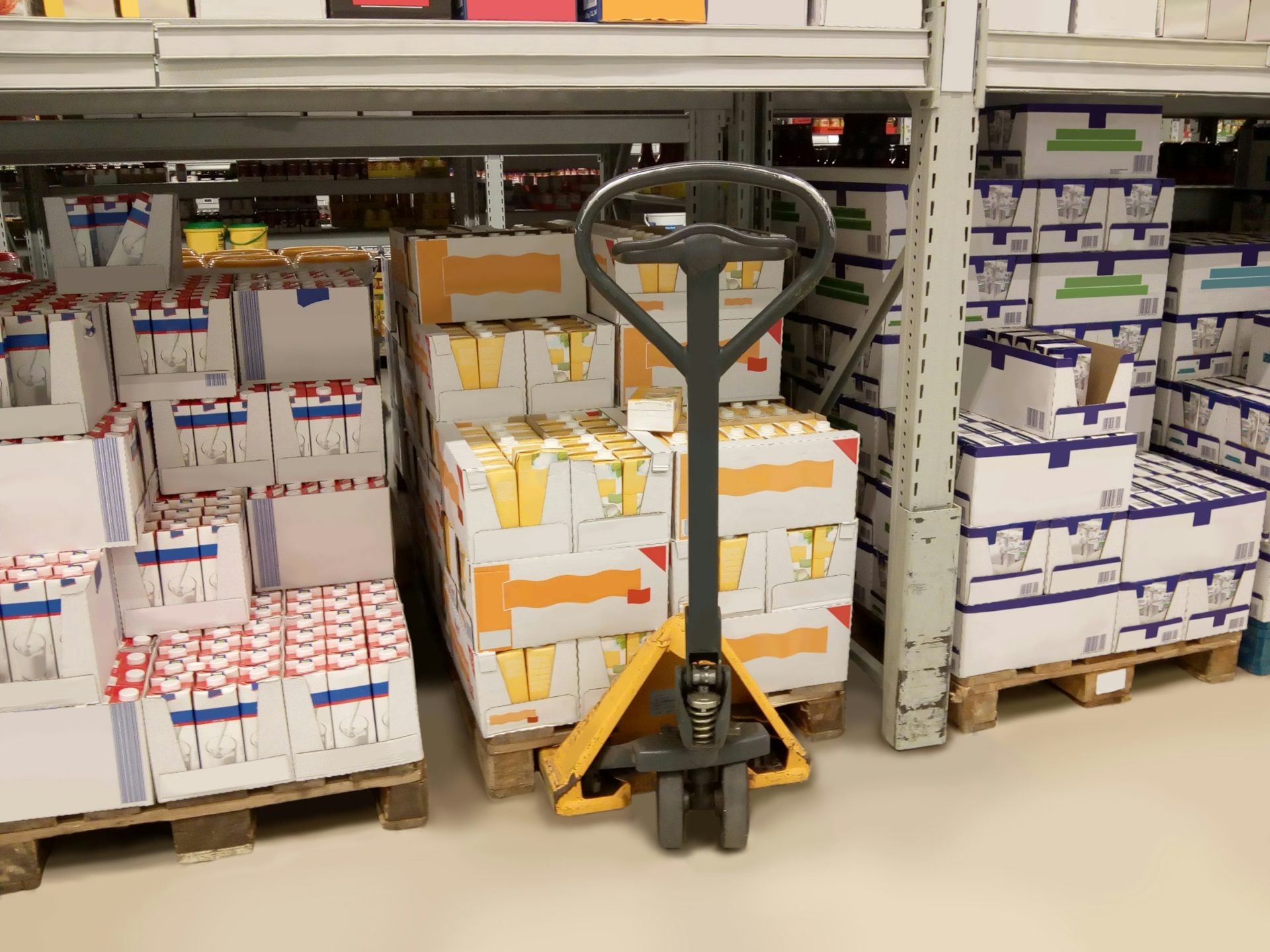pallets holding cartons of milk in a shop