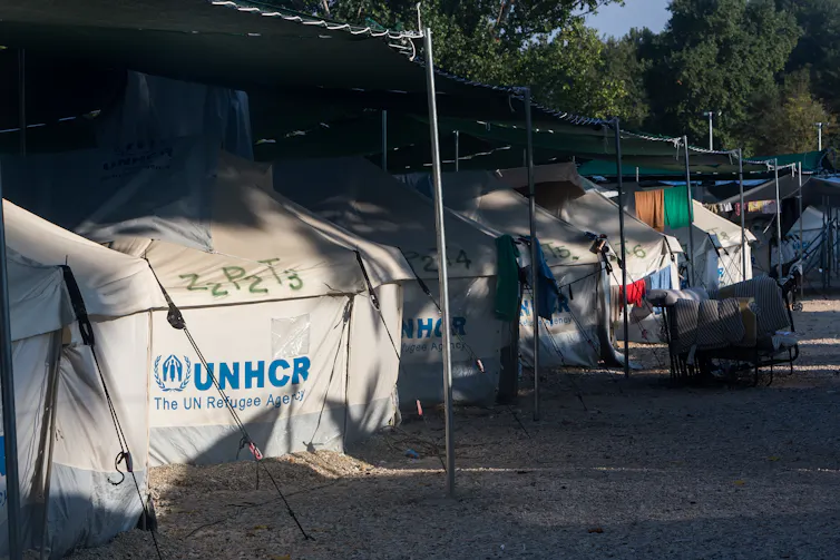 White tents with UNHCR printed on them
