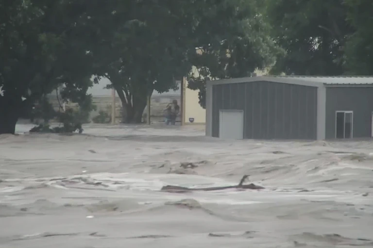 heavy flooding reaches halfway up buildings