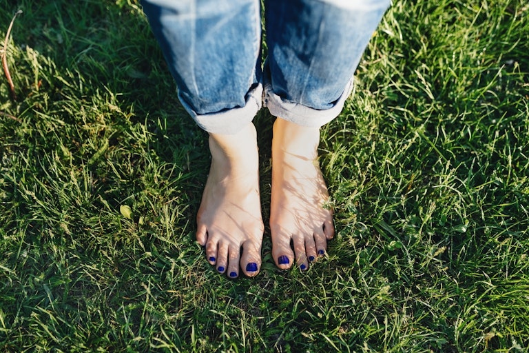 Woman's toes in the grass