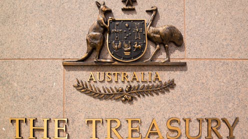 Treasury warns the government it may not balance the budget or meet its housing targets