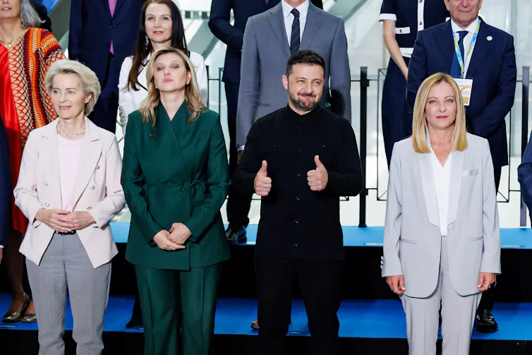 Ukrainian president Volodymyr Zelensky poses for 'family photograph' with his wife Olena, EU commission president Ursula von der Leyen and Italian prime minister Giorgia Meloni.
