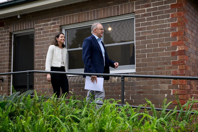 Anthony Albanese and Rose Jackson outside a social housing unit
