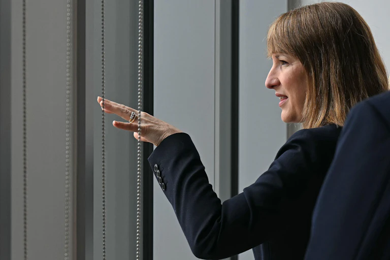 Rachel Reeves looking through a window.