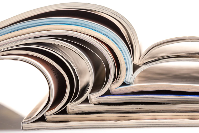 stack of journals all open