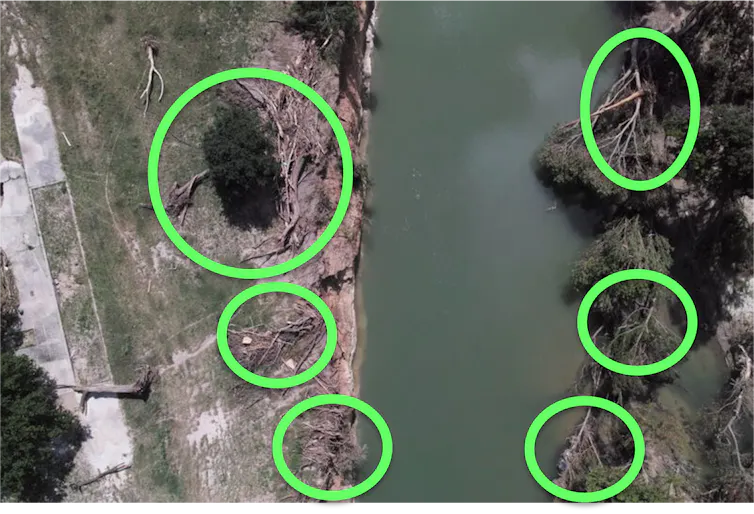 aerial view of a landscape with green rings superimposed
