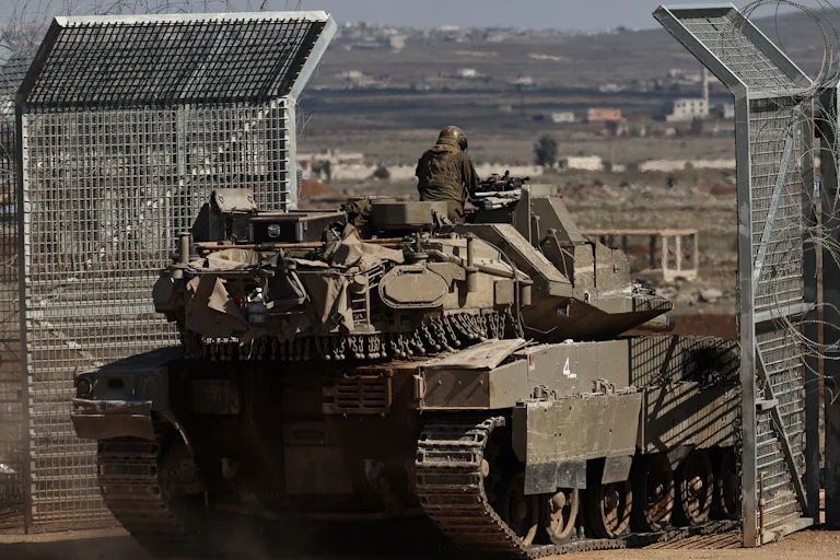 An IDF tank entering the buffer zone between Israel and Syria