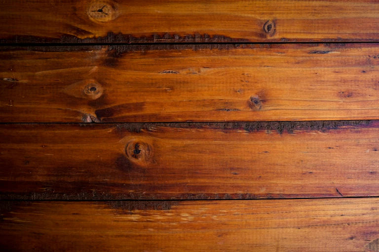 floorboards with knots and dark edges