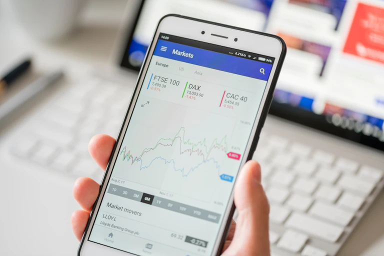 mobile phone screen showing stock market graphs