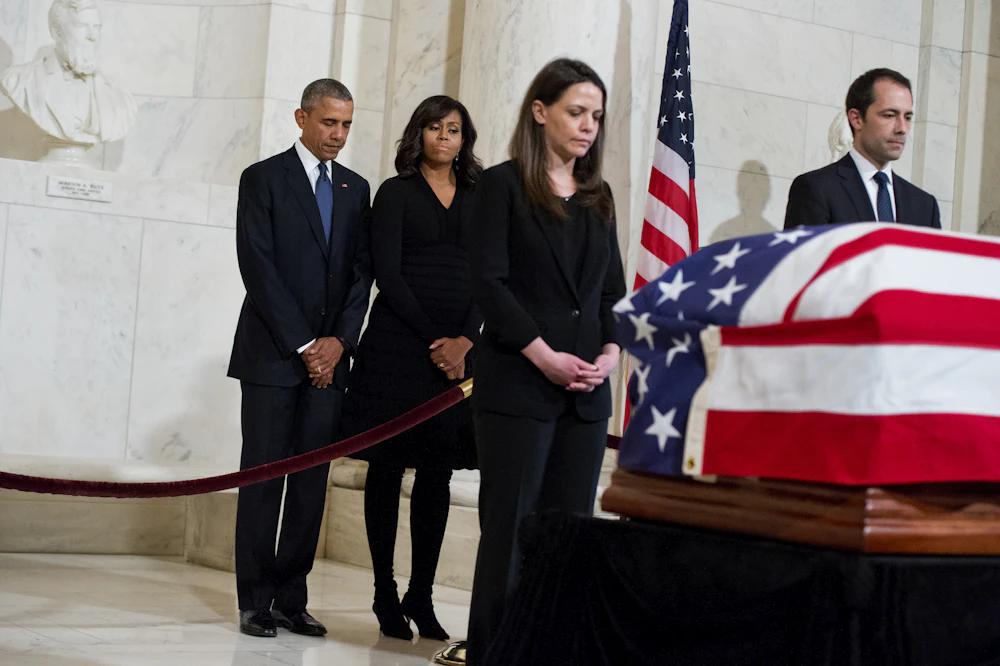 President Obama pays respect at Scalia's casket