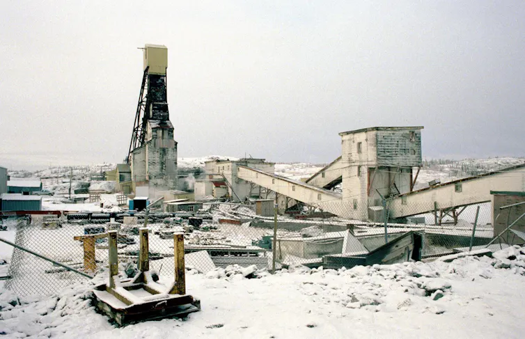 a mine headframe in a snow-covered area