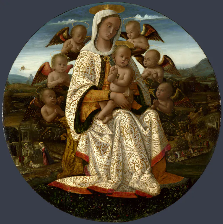 The Virgin Mary embraces the infant Christ.