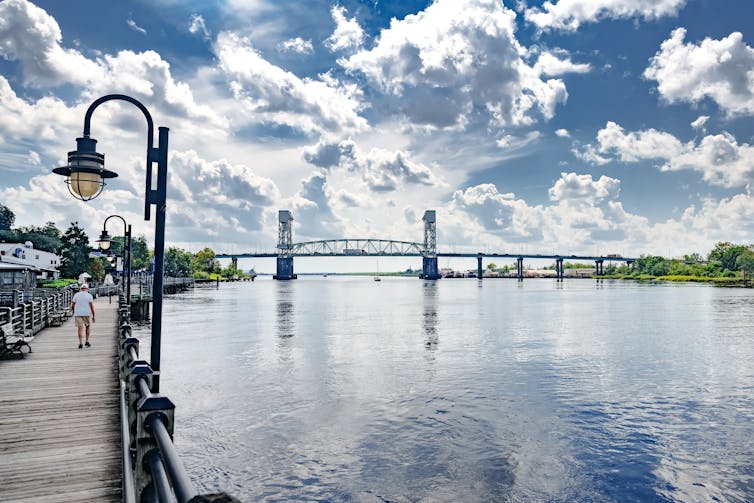 waterfront by cape fear river, sunny blue skies