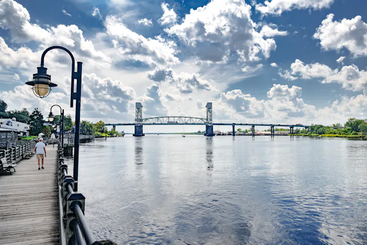 waterfront by cape fear river, sunny blue skies