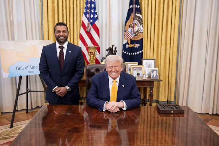 Donald Trump posing with FBI director Kash Patel.